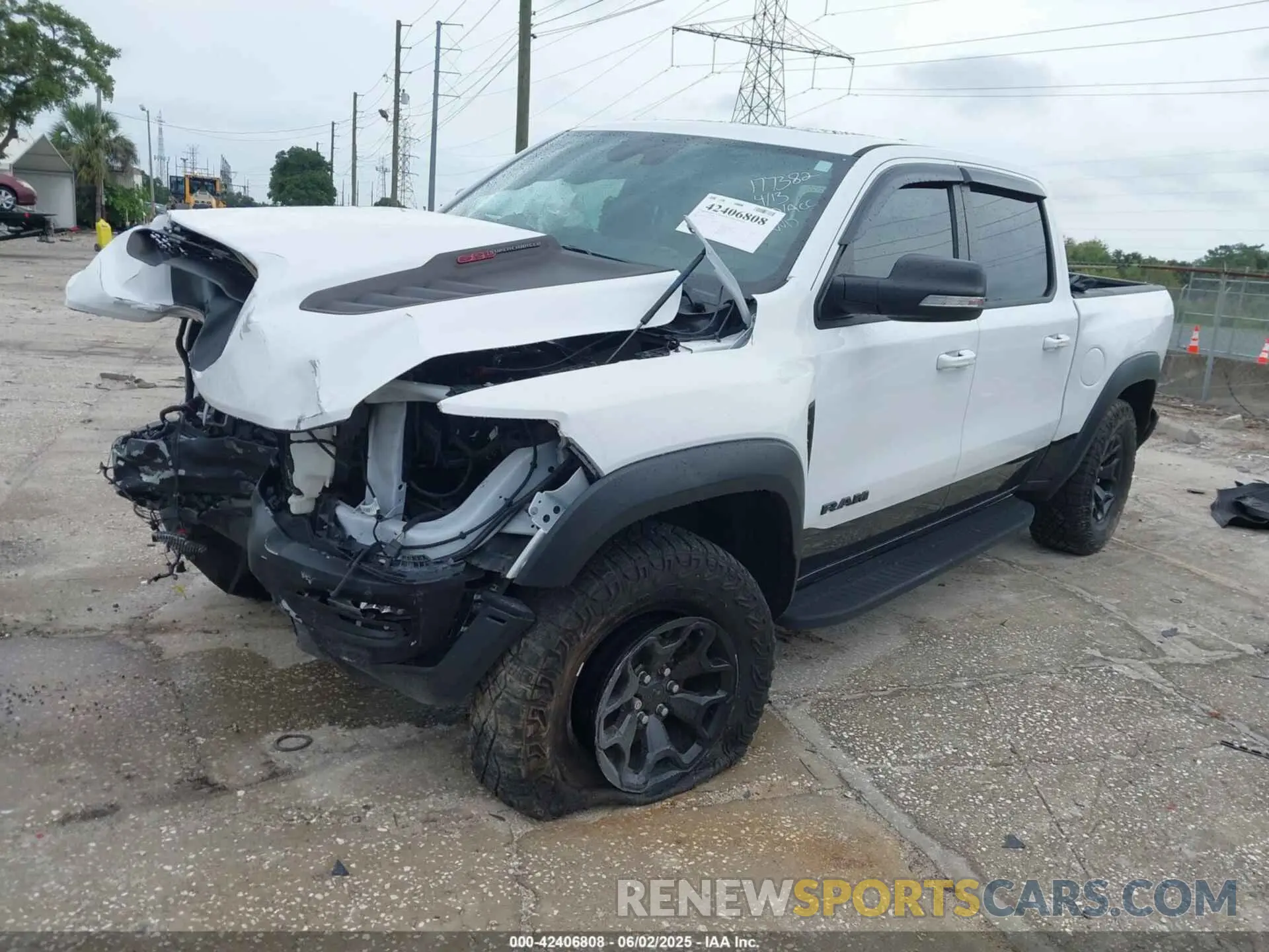 2 Photograph of a damaged car 1C6SRFU97MN719899 RAM 1500 2021