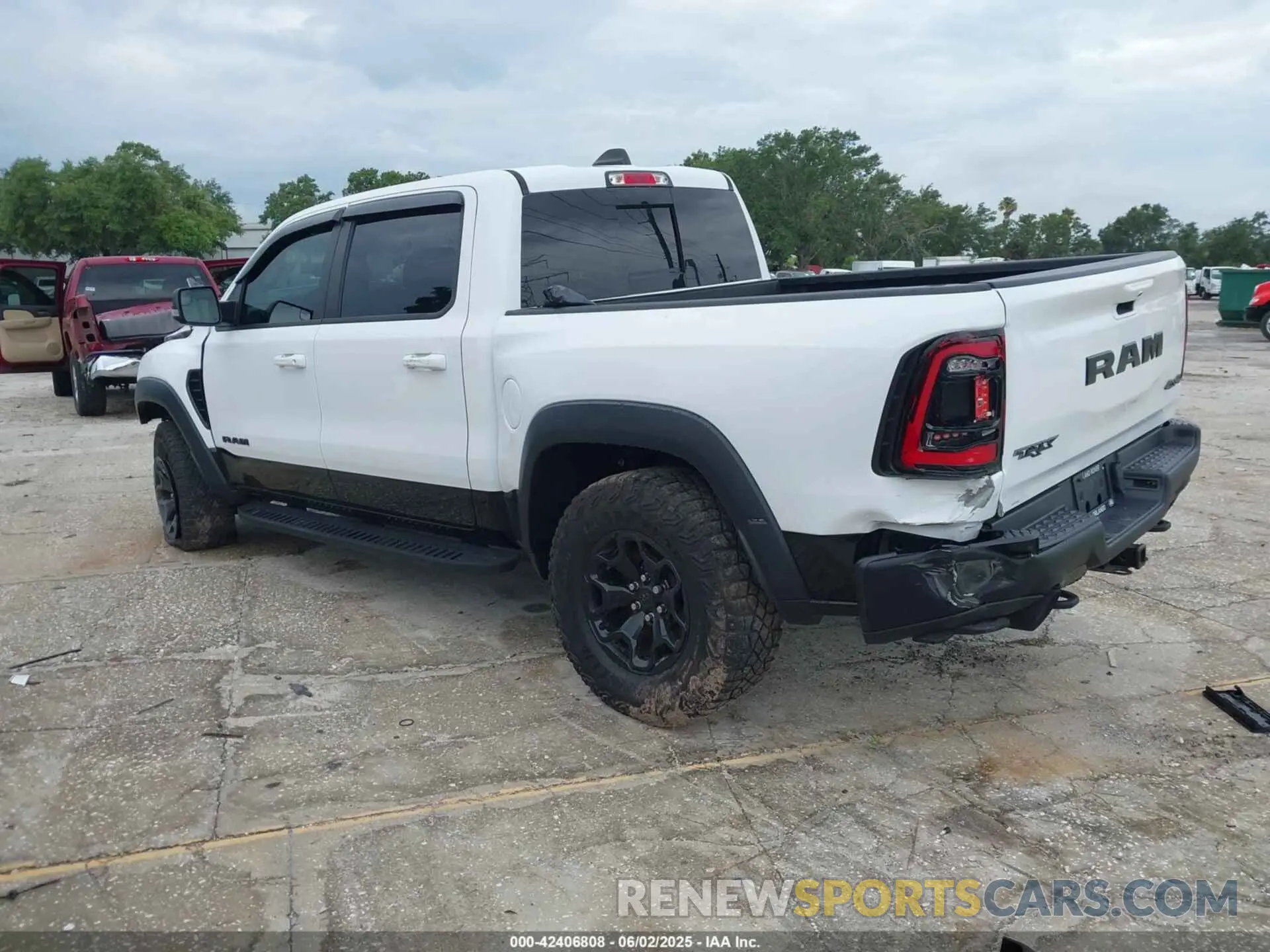 3 Photograph of a damaged car 1C6SRFU97MN719899 RAM 1500 2021