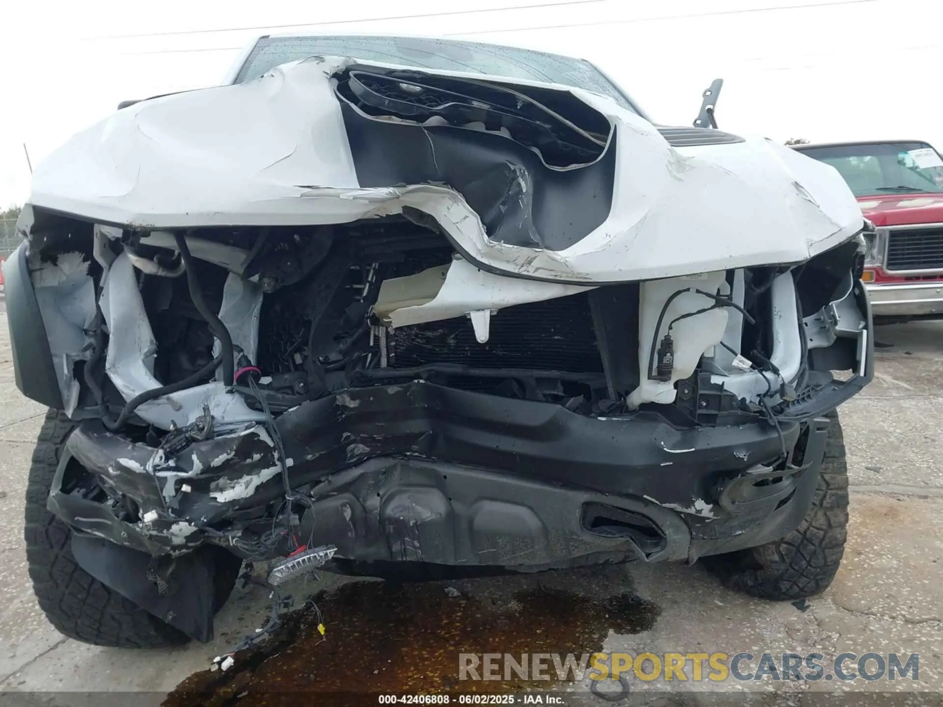 6 Photograph of a damaged car 1C6SRFU97MN719899 RAM 1500 2021