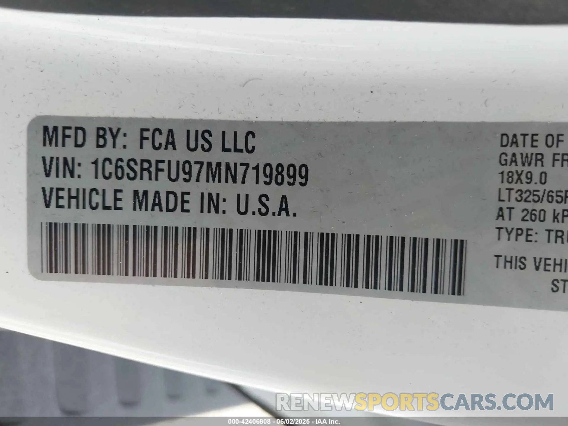 9 Photograph of a damaged car 1C6SRFU97MN719899 RAM 1500 2021