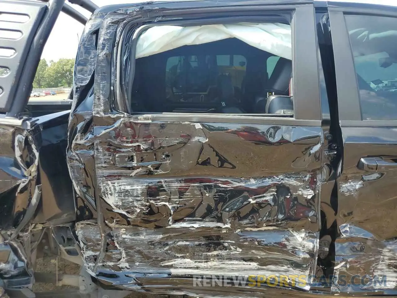 10 Photograph of a damaged car 1C6SRFU97MN727629 RAM 1500 2021