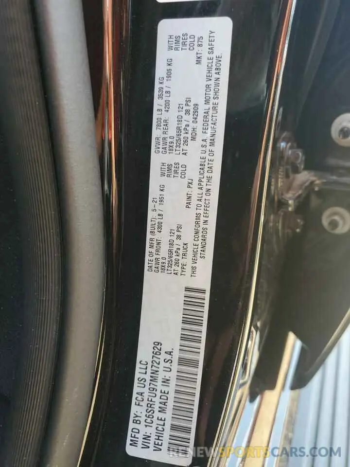 12 Photograph of a damaged car 1C6SRFU97MN727629 RAM 1500 2021