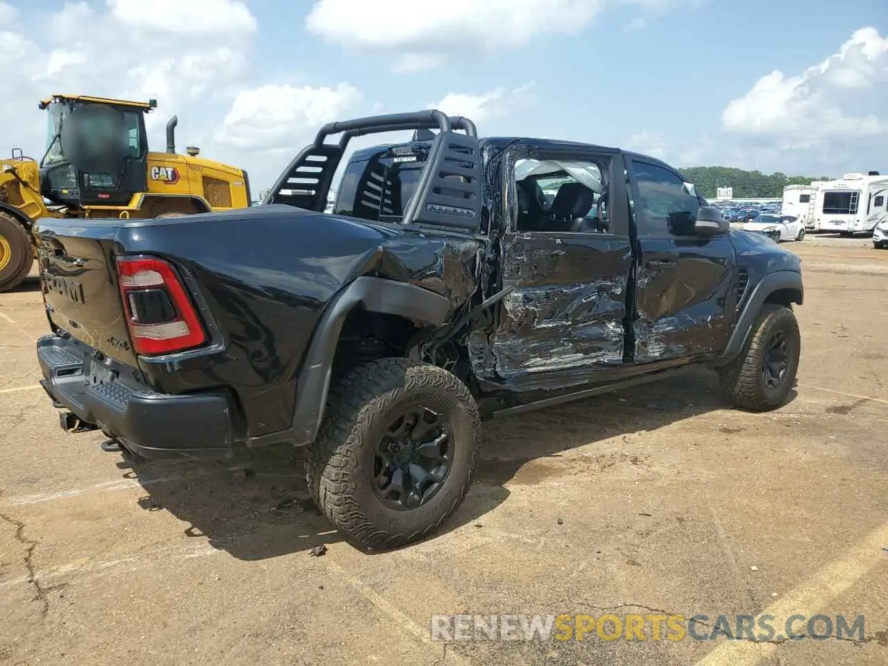 3 Photograph of a damaged car 1C6SRFU97MN727629 RAM 1500 2021
