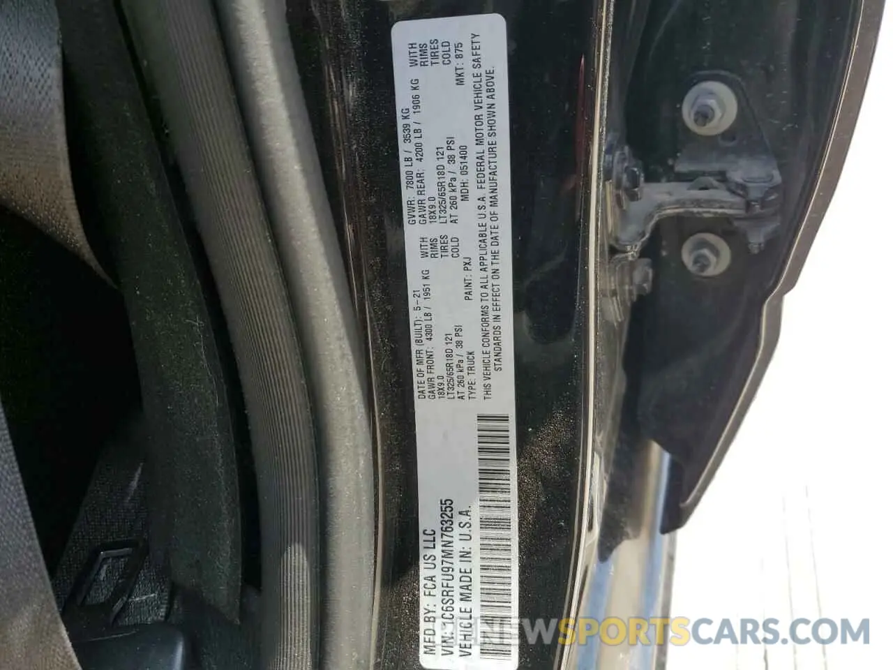 12 Photograph of a damaged car 1C6SRFU97MN763255 RAM 1500 2021