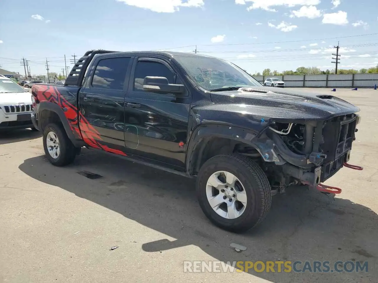 4 Photograph of a damaged car 1C6SRFU97MN763255 RAM 1500 2021