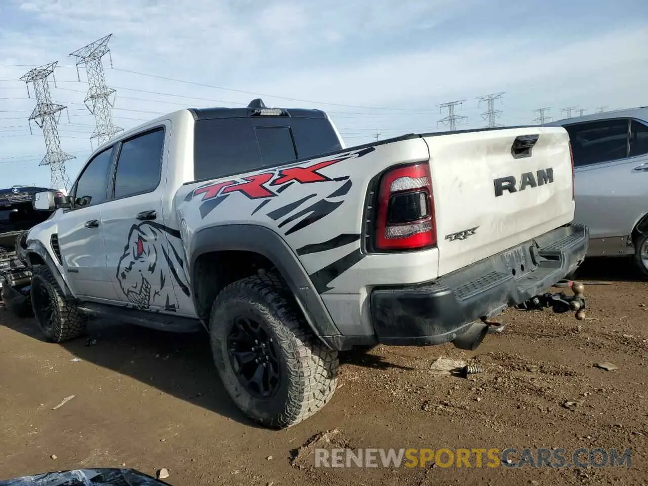 2 Photograph of a damaged car 1C6SRFU97MN791556 RAM 1500 2021