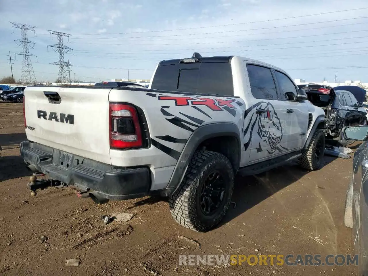 3 Photograph of a damaged car 1C6SRFU97MN791556 RAM 1500 2021