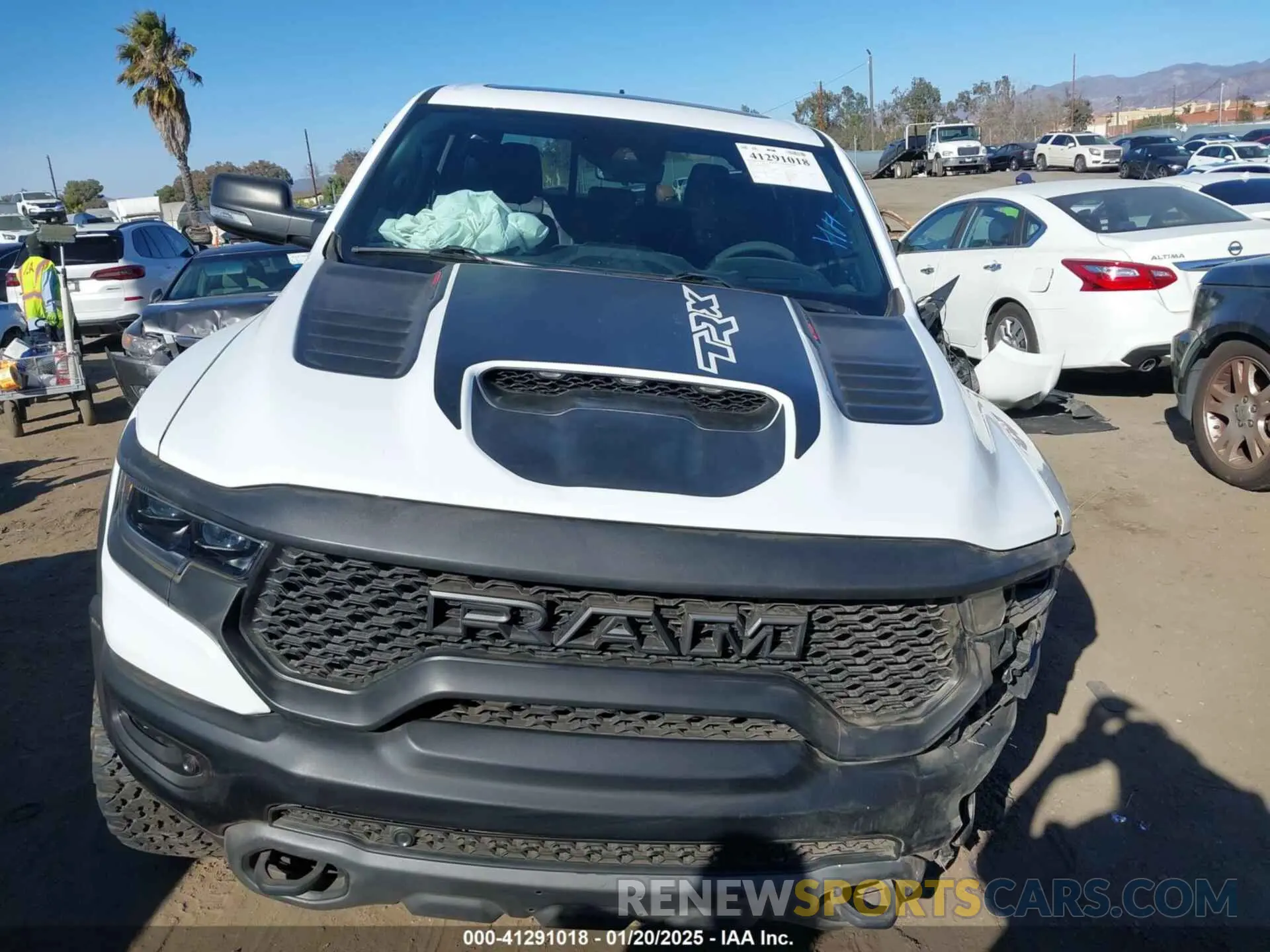 11 Photograph of a damaged car 1C6SRFU97MN906138 RAM 1500 2021