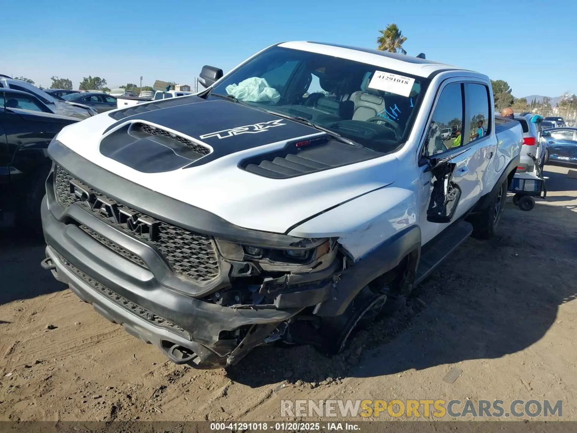 2 Photograph of a damaged car 1C6SRFU97MN906138 RAM 1500 2021
