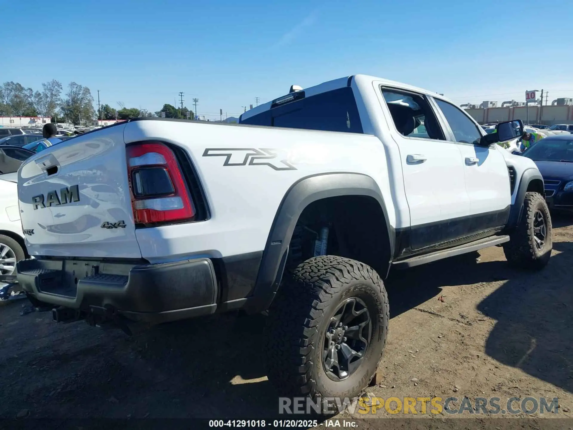 4 Photograph of a damaged car 1C6SRFU97MN906138 RAM 1500 2021