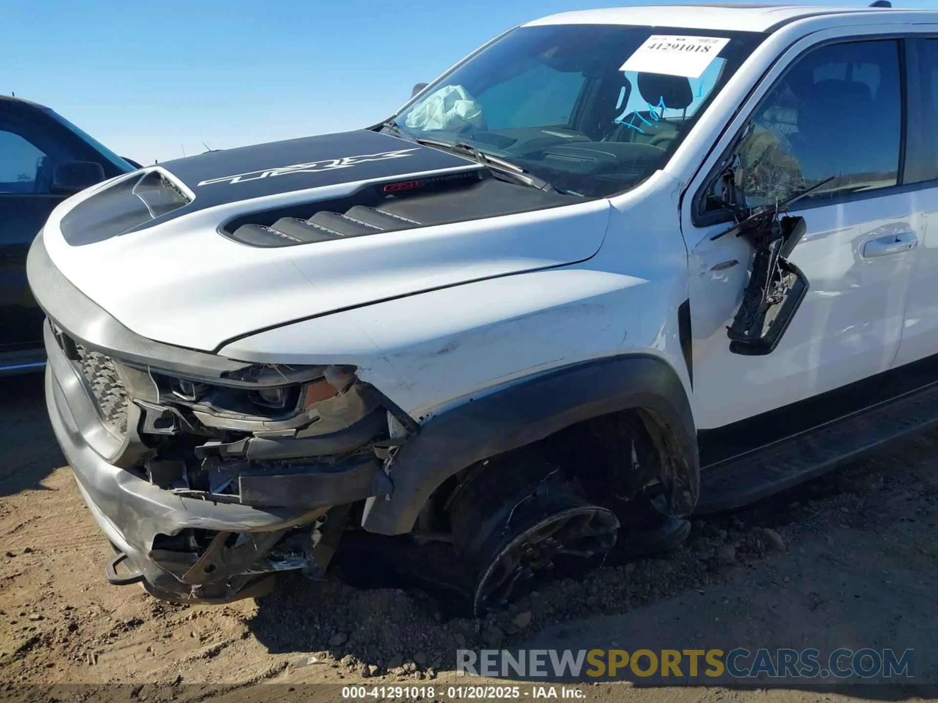6 Photograph of a damaged car 1C6SRFU97MN906138 RAM 1500 2021