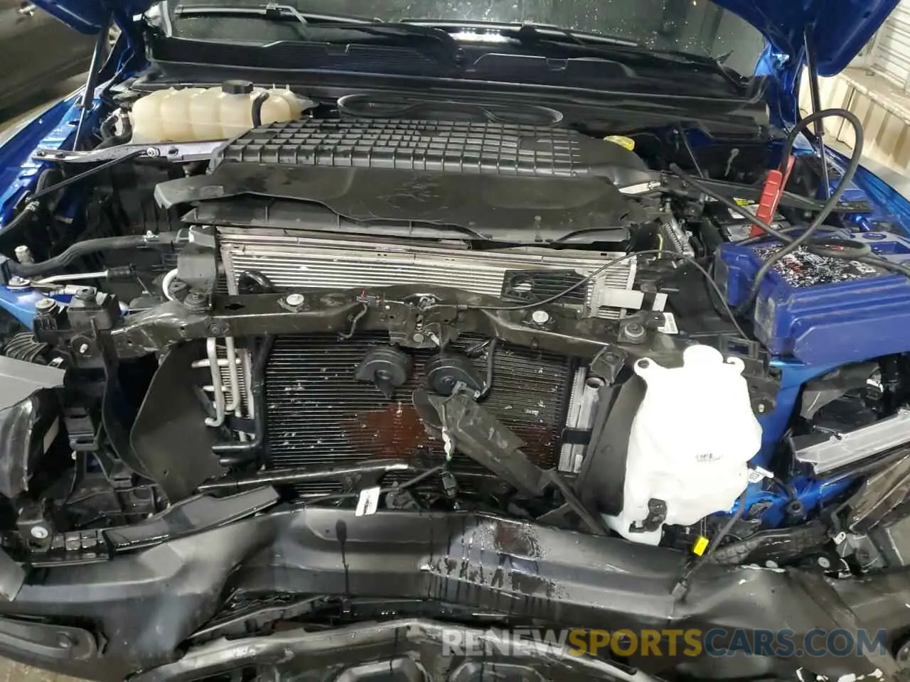 12 Photograph of a damaged car 1C6SRFU98MN754533 RAM 1500 2021
