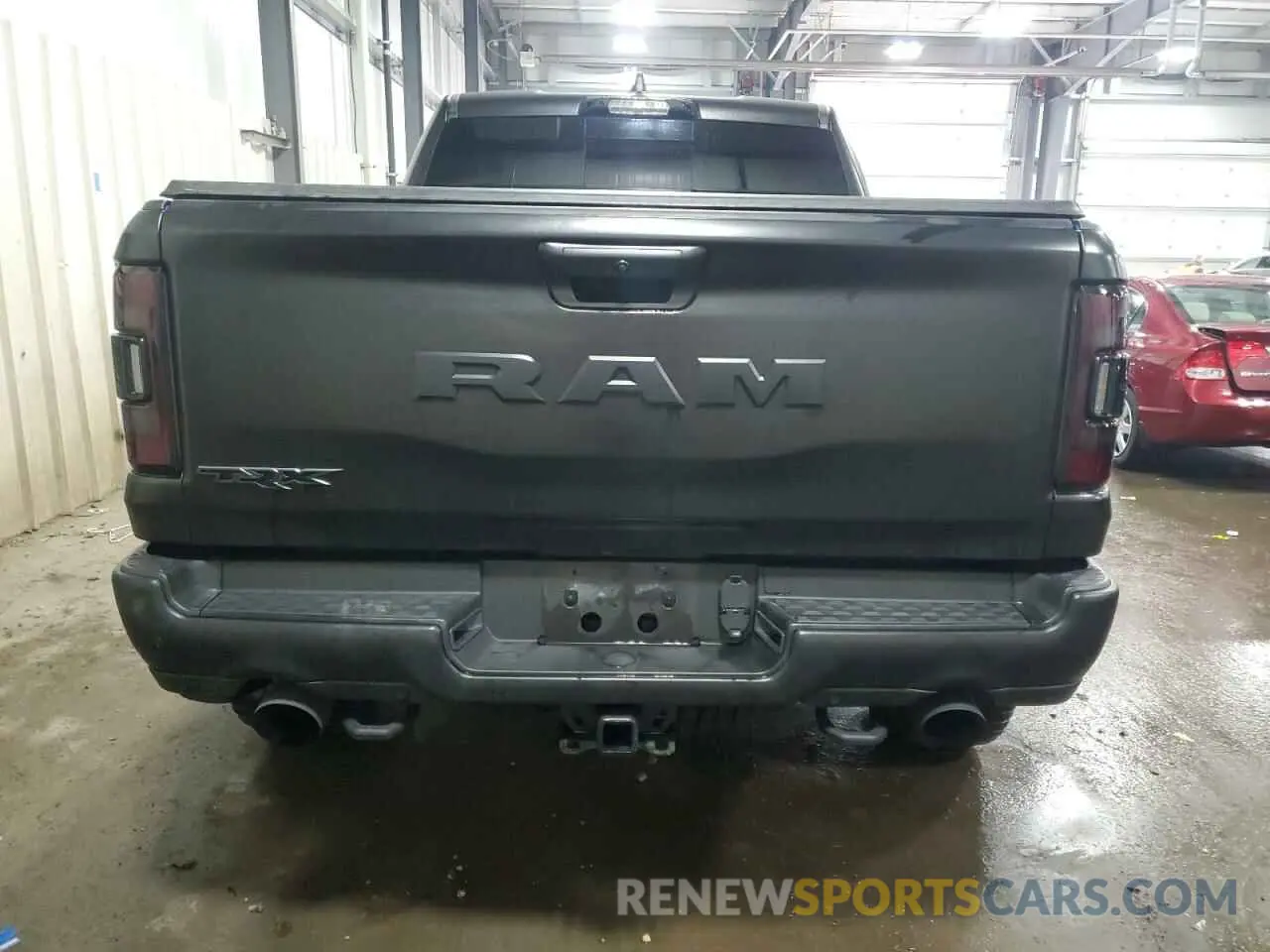 6 Photograph of a damaged car 1C6SRFU98MN754533 RAM 1500 2021