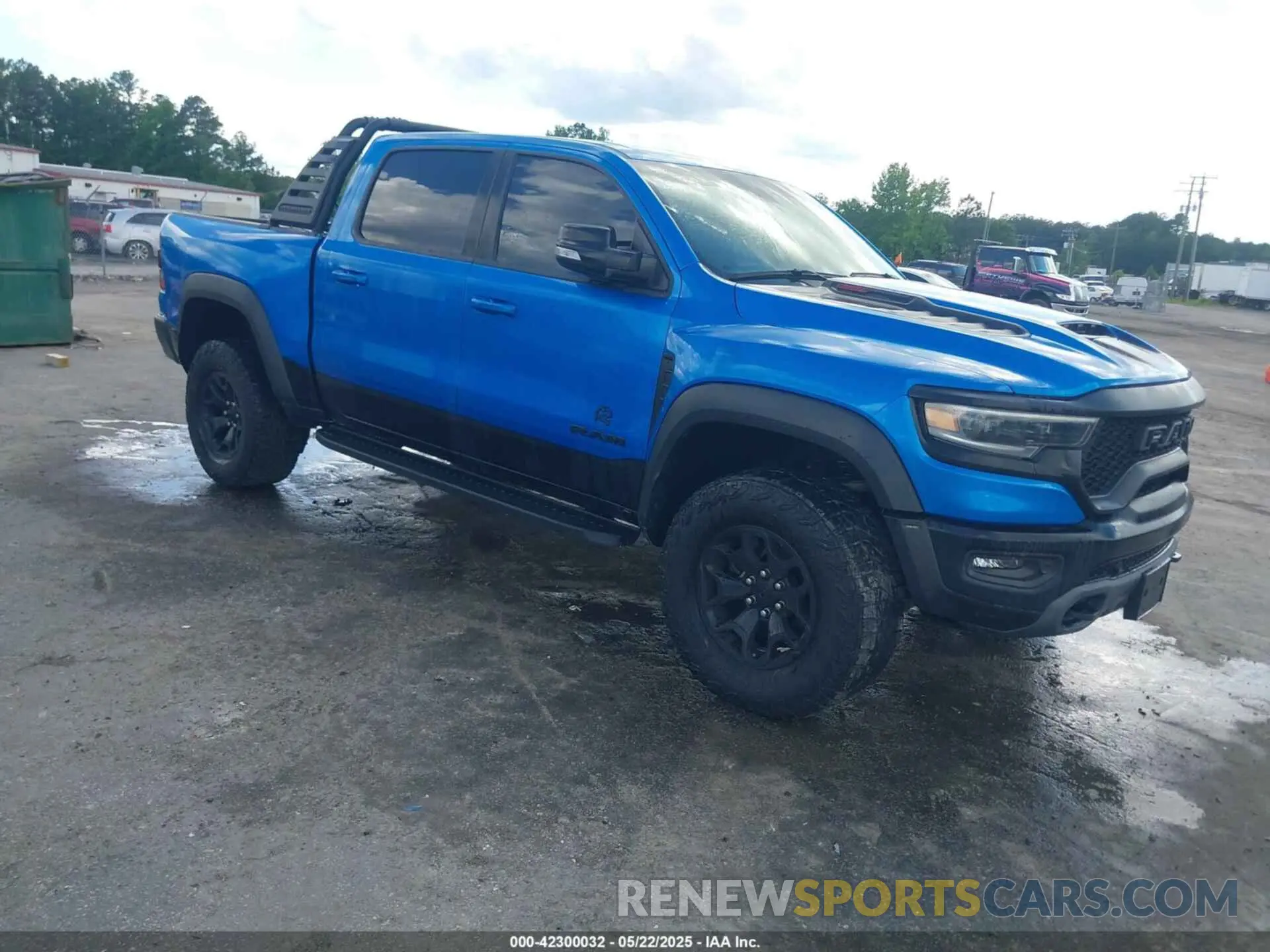 1 Photograph of a damaged car 1C6SRFU98MN804461 RAM 1500 2021