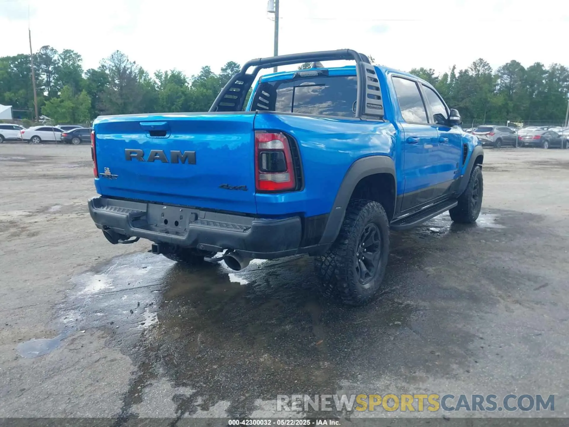 4 Photograph of a damaged car 1C6SRFU98MN804461 RAM 1500 2021