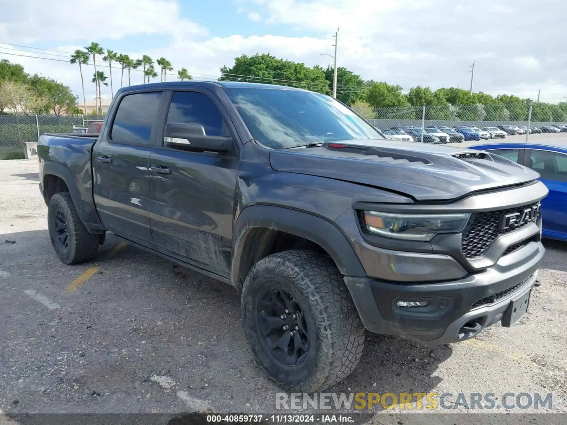 1 Photograph of a damaged car 1C6SRFU99MN738308 RAM 1500 2021