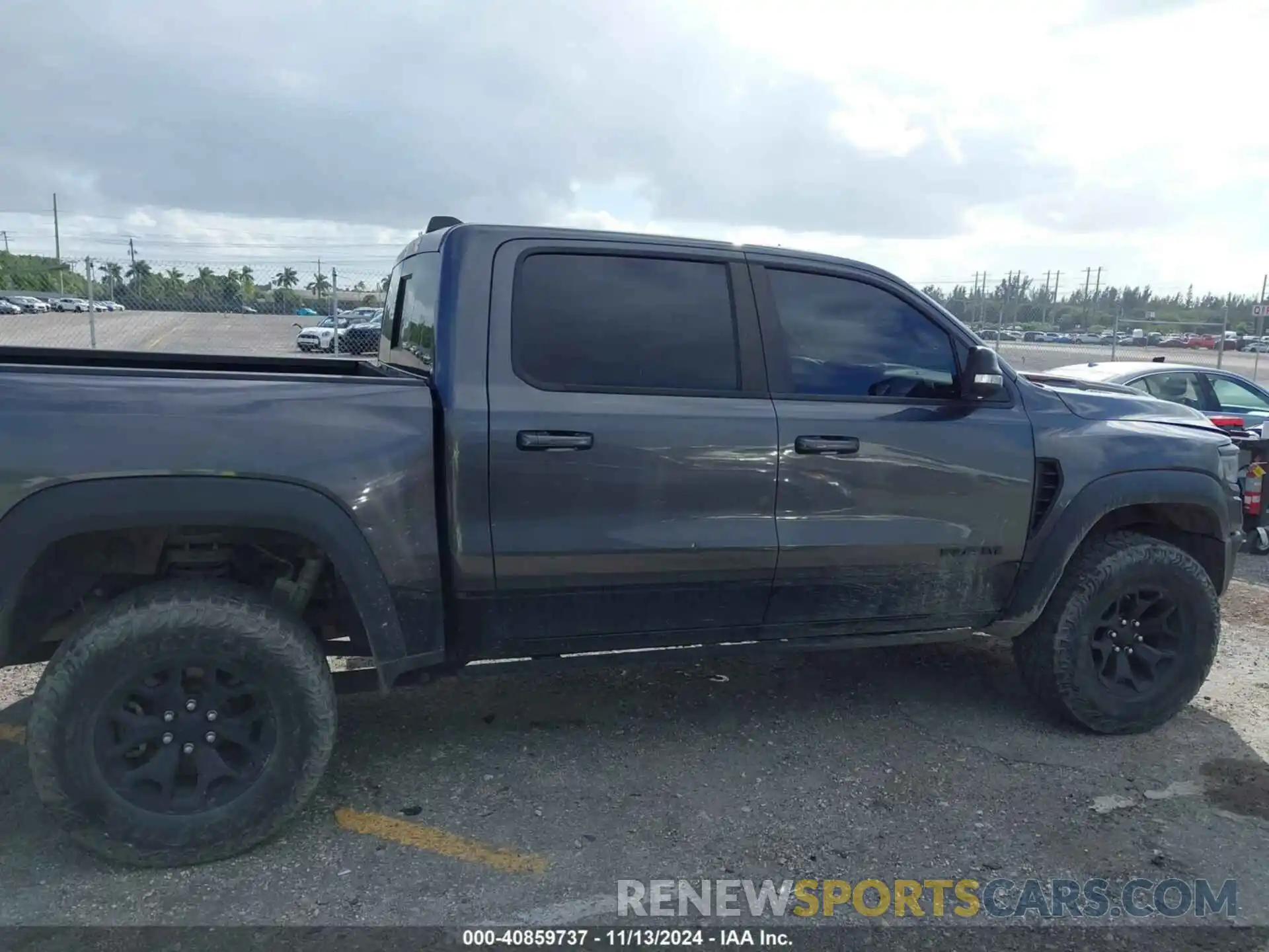 13 Photograph of a damaged car 1C6SRFU99MN738308 RAM 1500 2021