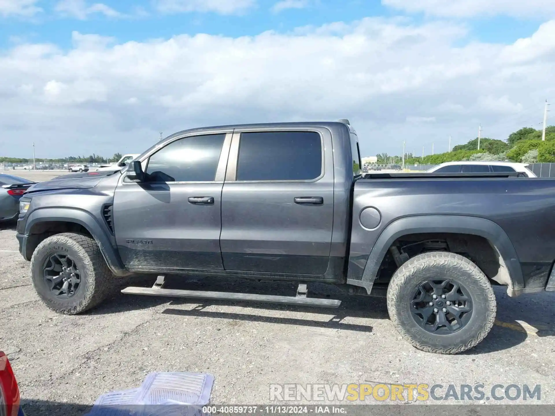 14 Photograph of a damaged car 1C6SRFU99MN738308 RAM 1500 2021