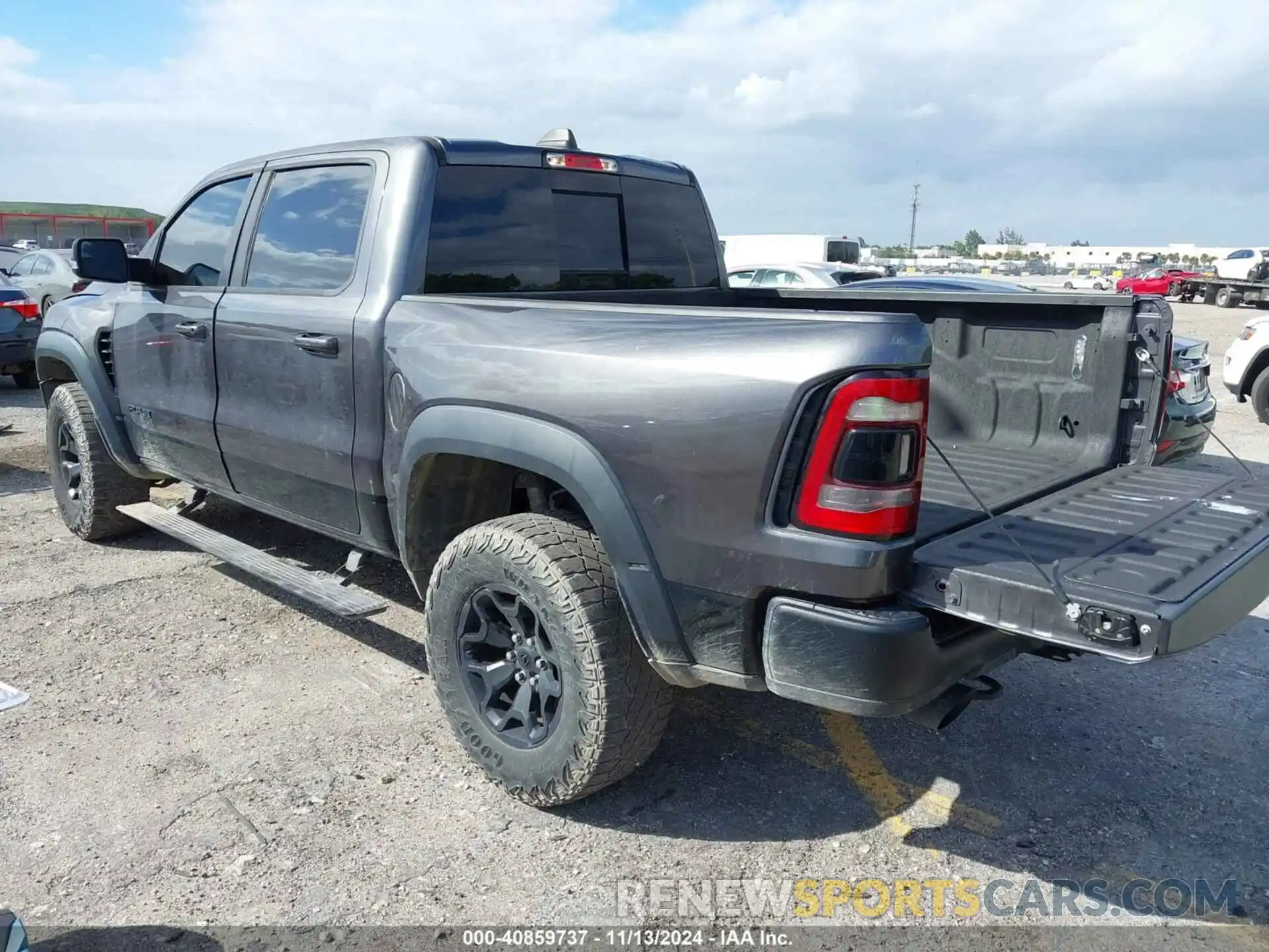 3 Photograph of a damaged car 1C6SRFU99MN738308 RAM 1500 2021