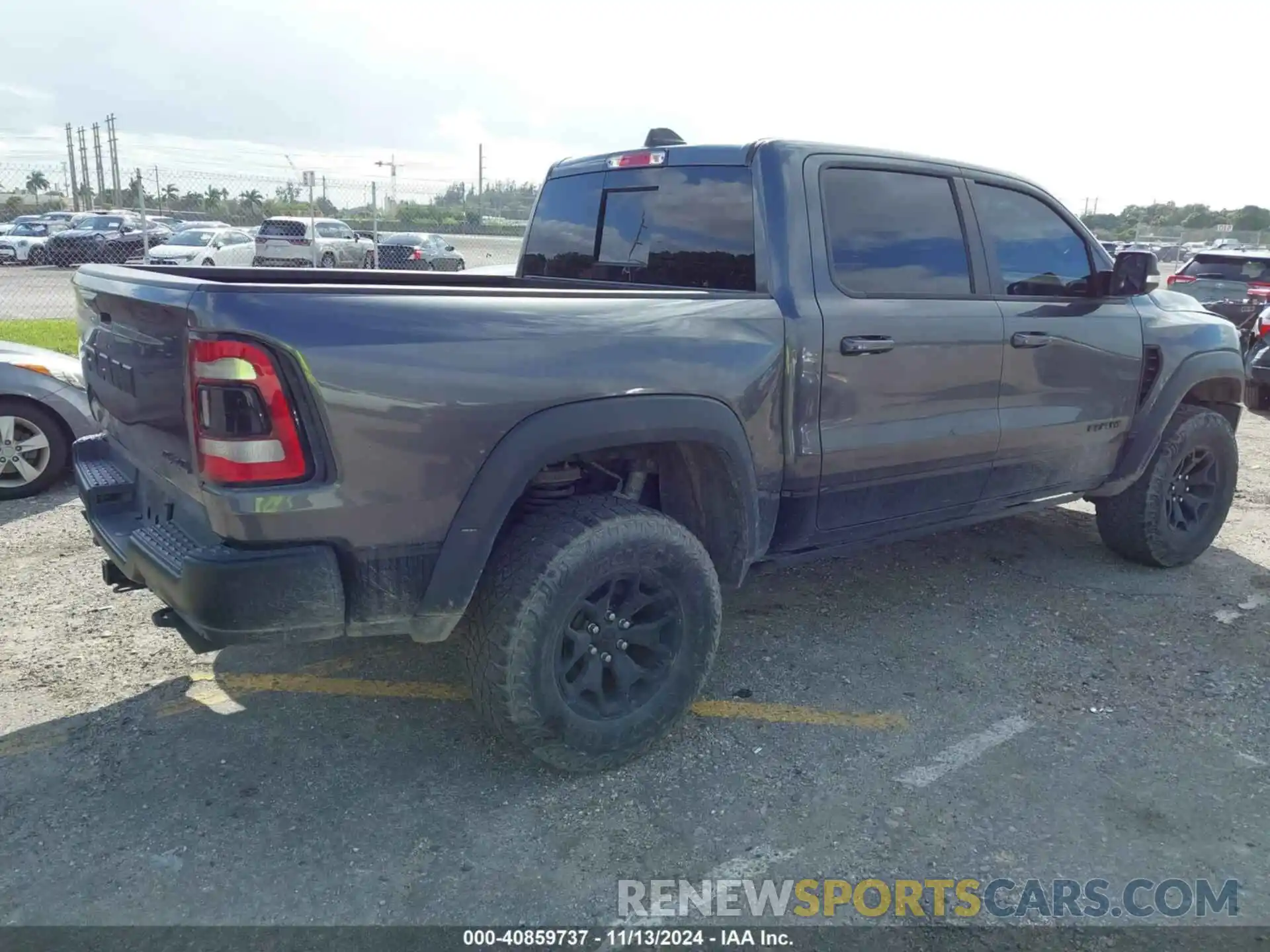 4 Photograph of a damaged car 1C6SRFU99MN738308 RAM 1500 2021