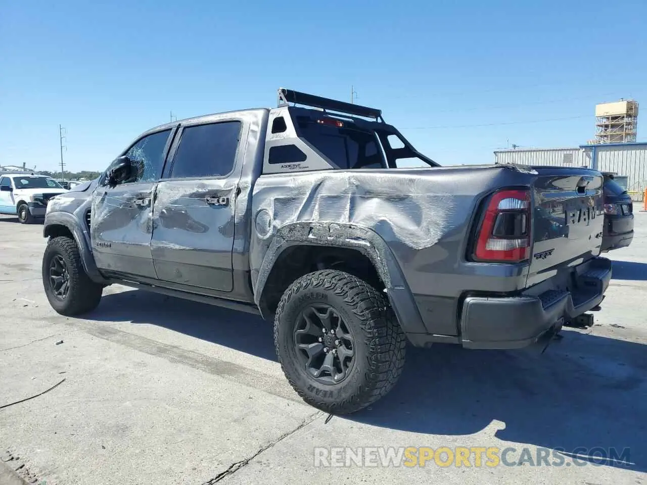 2 Photograph of a damaged car 1C6SRFU99MN744688 RAM 1500 2021