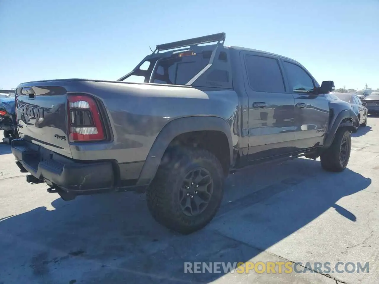 3 Photograph of a damaged car 1C6SRFU99MN744688 RAM 1500 2021