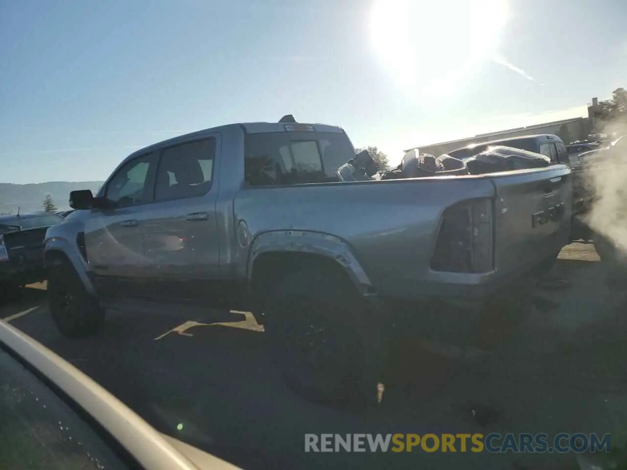 2 Photograph of a damaged car 1C6SRFU99MN781711 RAM 1500 2021