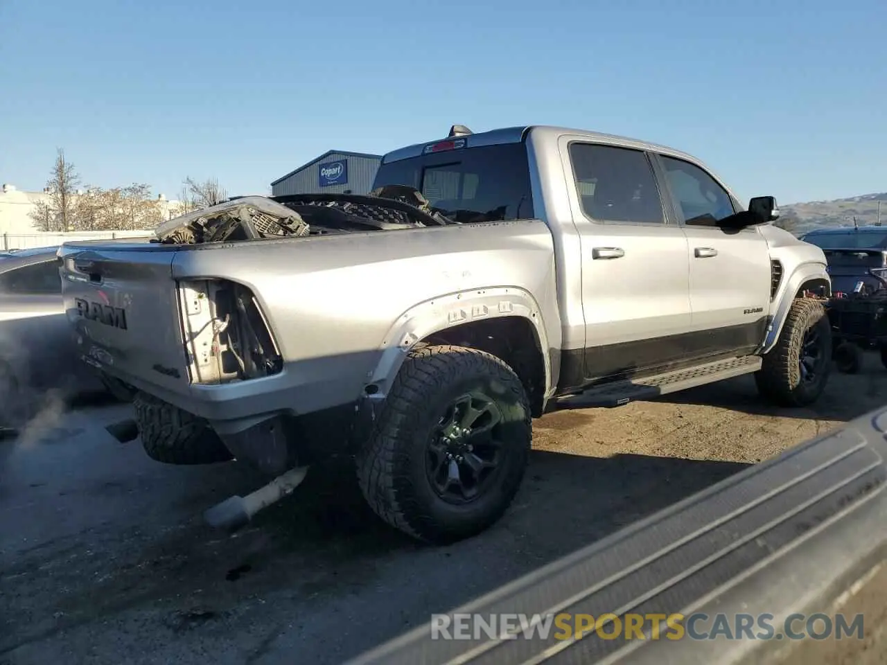 3 Photograph of a damaged car 1C6SRFU99MN781711 RAM 1500 2021