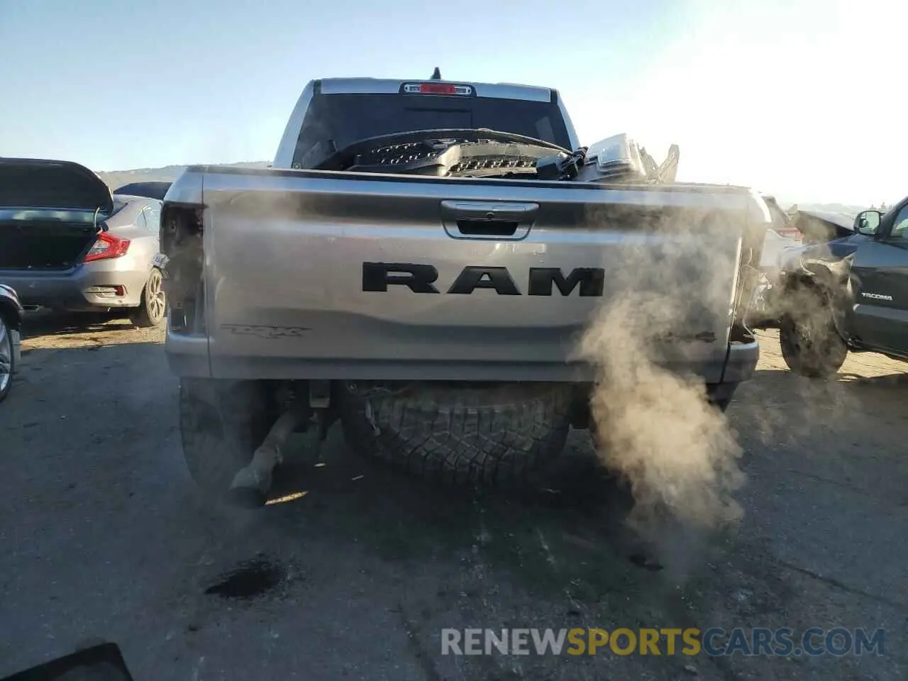 6 Photograph of a damaged car 1C6SRFU99MN781711 RAM 1500 2021