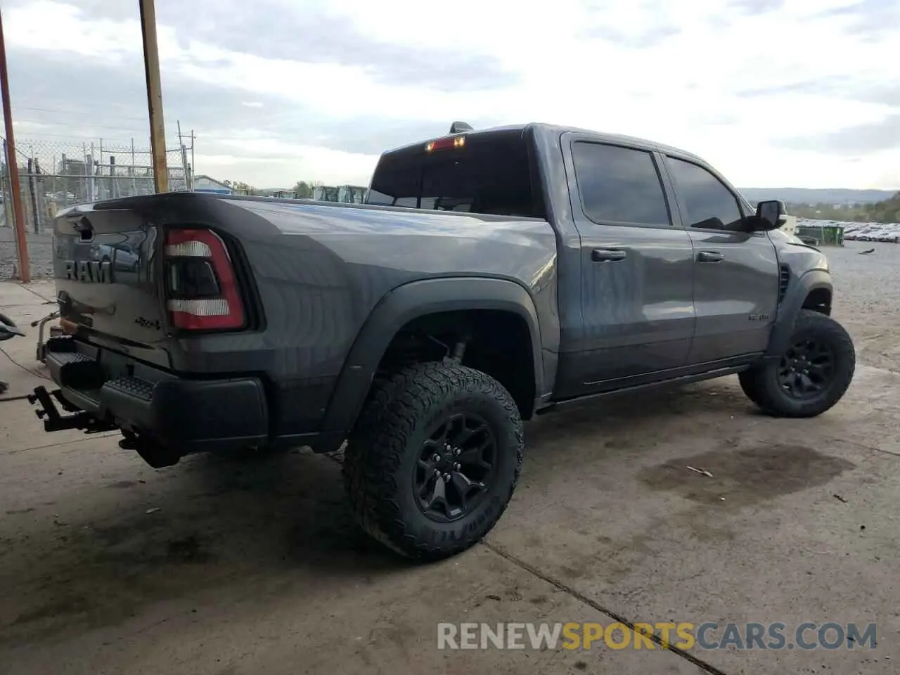 3 Photograph of a damaged car 1C6SRFU99MN804758 RAM 1500 2021