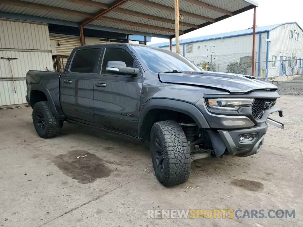 4 Photograph of a damaged car 1C6SRFU99MN804758 RAM 1500 2021