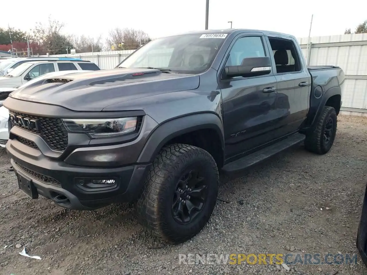 1 Photograph of a damaged car 1C6SRFU9XMN743419 RAM 1500 2021