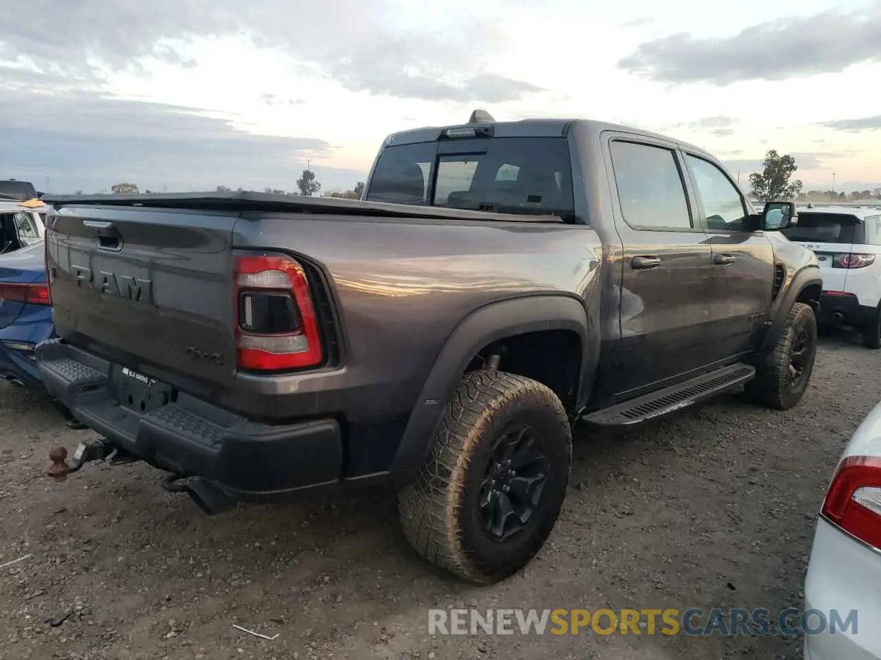 3 Photograph of a damaged car 1C6SRFU9XMN743419 RAM 1500 2021