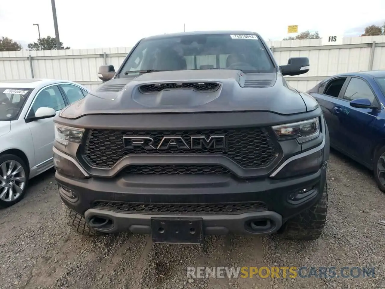 5 Photograph of a damaged car 1C6SRFU9XMN743419 RAM 1500 2021