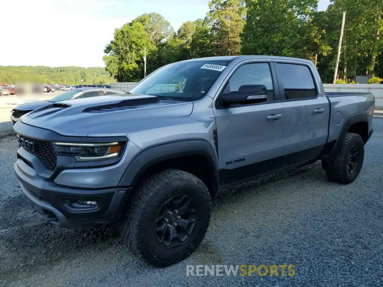 1 Photograph of a damaged car 1C6SRFU9XMN905436 RAM 1500 2021
