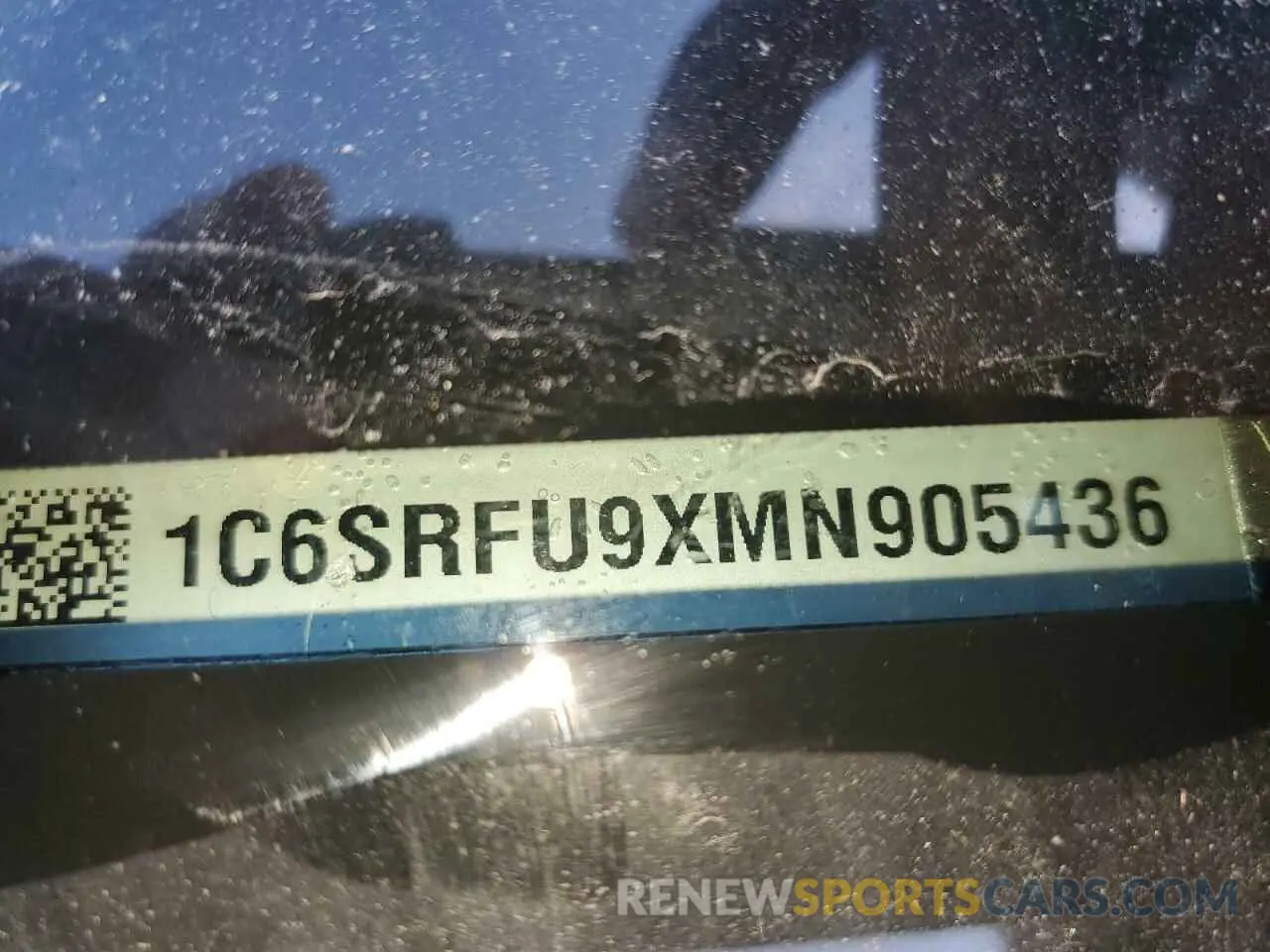 12 Photograph of a damaged car 1C6SRFU9XMN905436 RAM 1500 2021