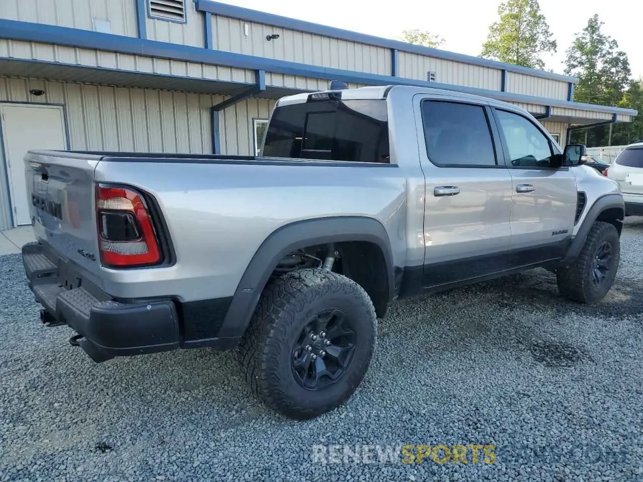 3 Photograph of a damaged car 1C6SRFU9XMN905436 RAM 1500 2021