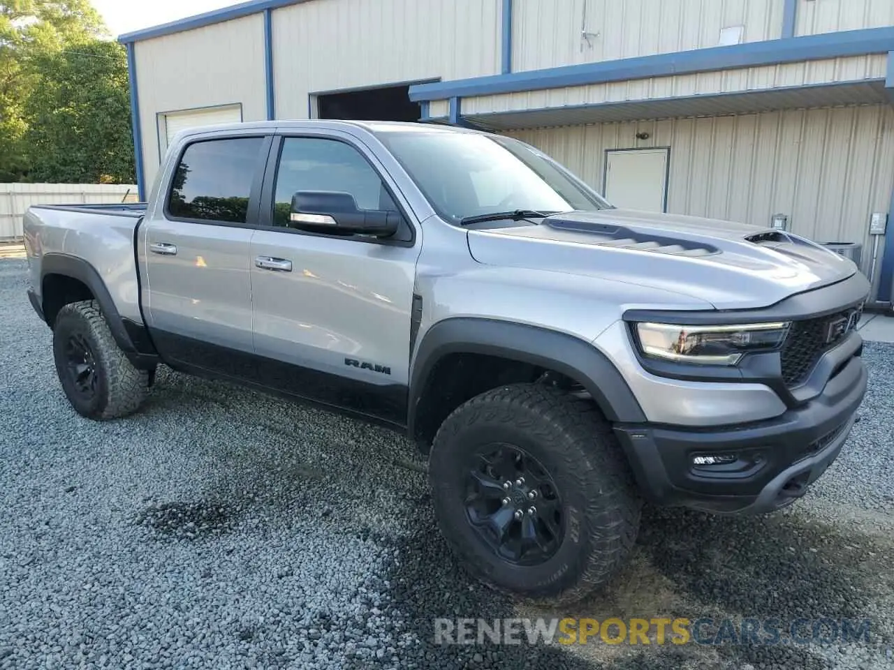 4 Photograph of a damaged car 1C6SRFU9XMN905436 RAM 1500 2021