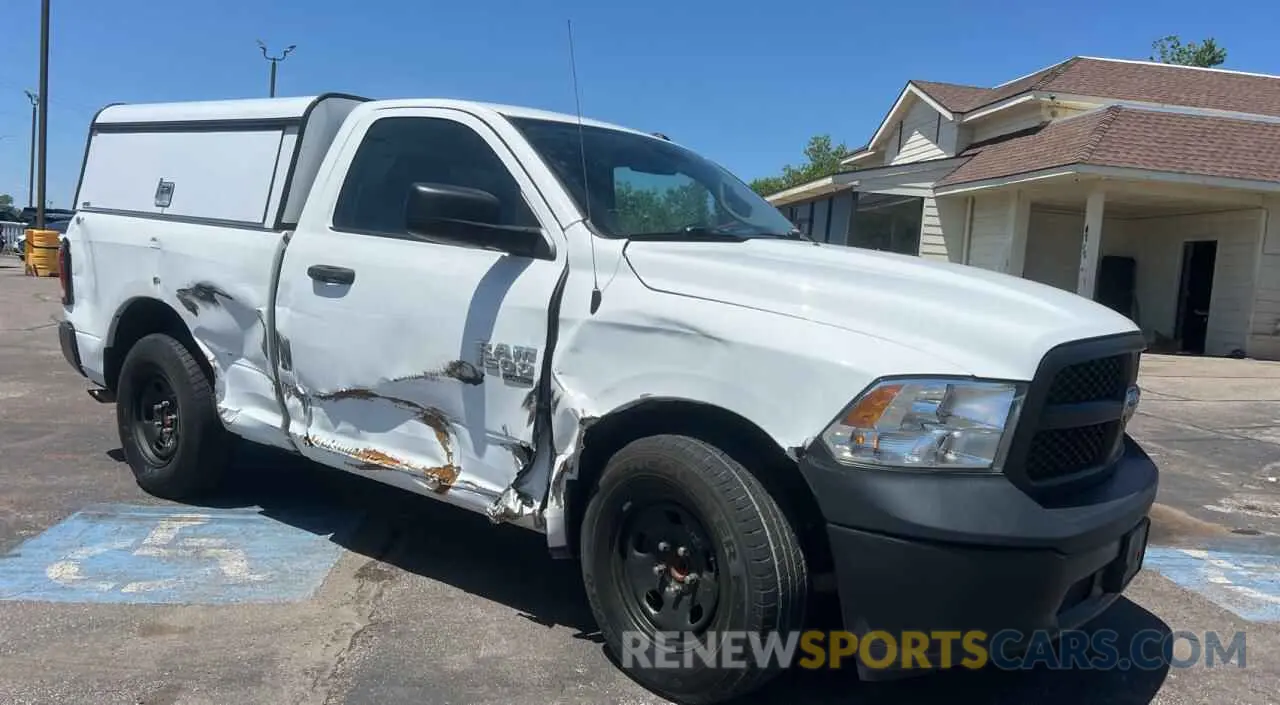 1 Photograph of a damaged car 3C6JR6AG1MG521178 RAM 1500 2021