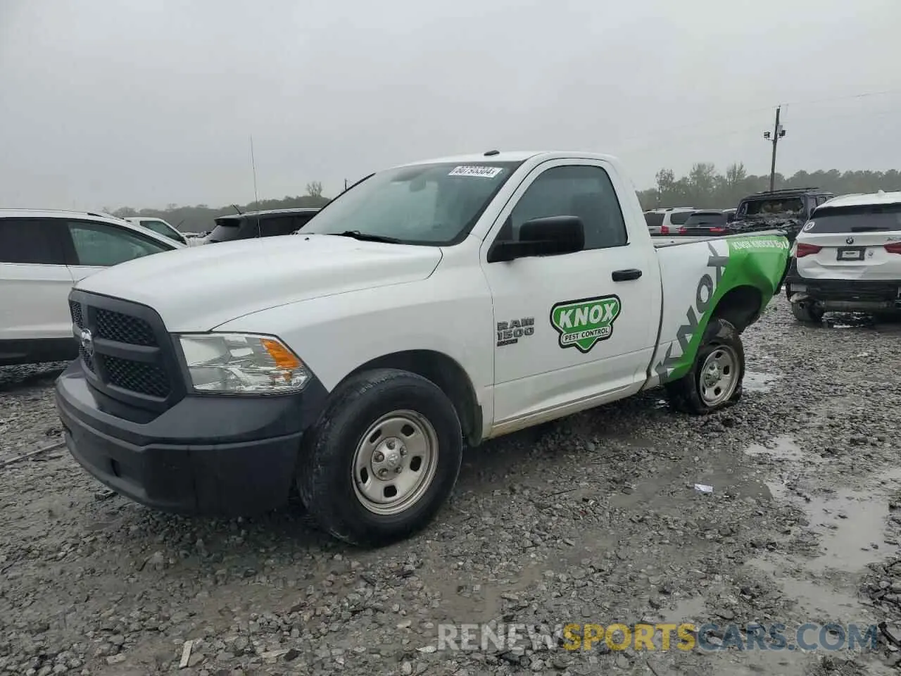 1 Photograph of a damaged car 3C6JR6AG4MG513169 RAM 1500 2021