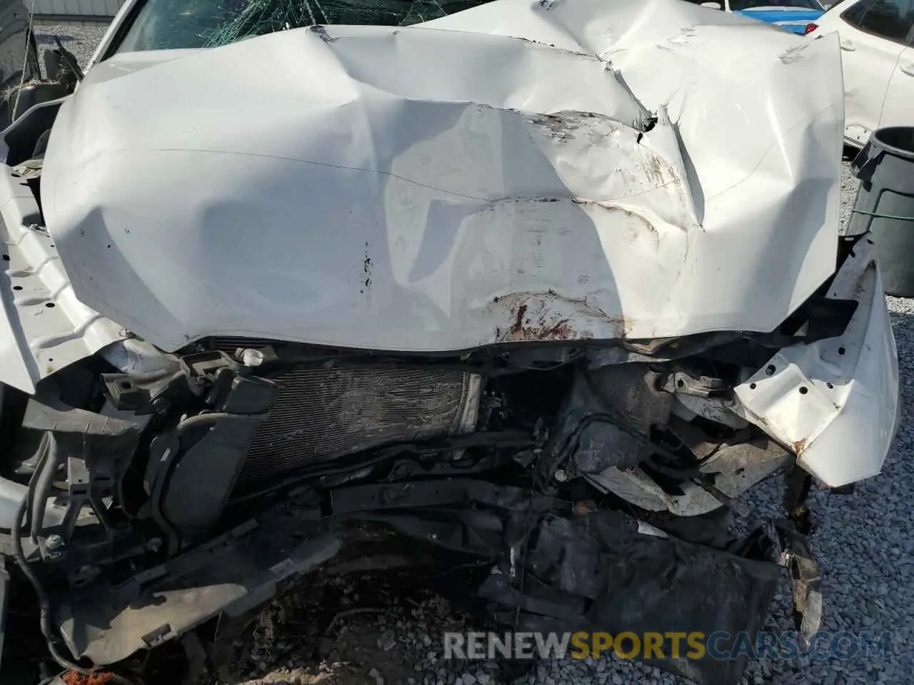 11 Photograph of a damaged car 3C6JR6DG7MG504087 RAM 1500 2021