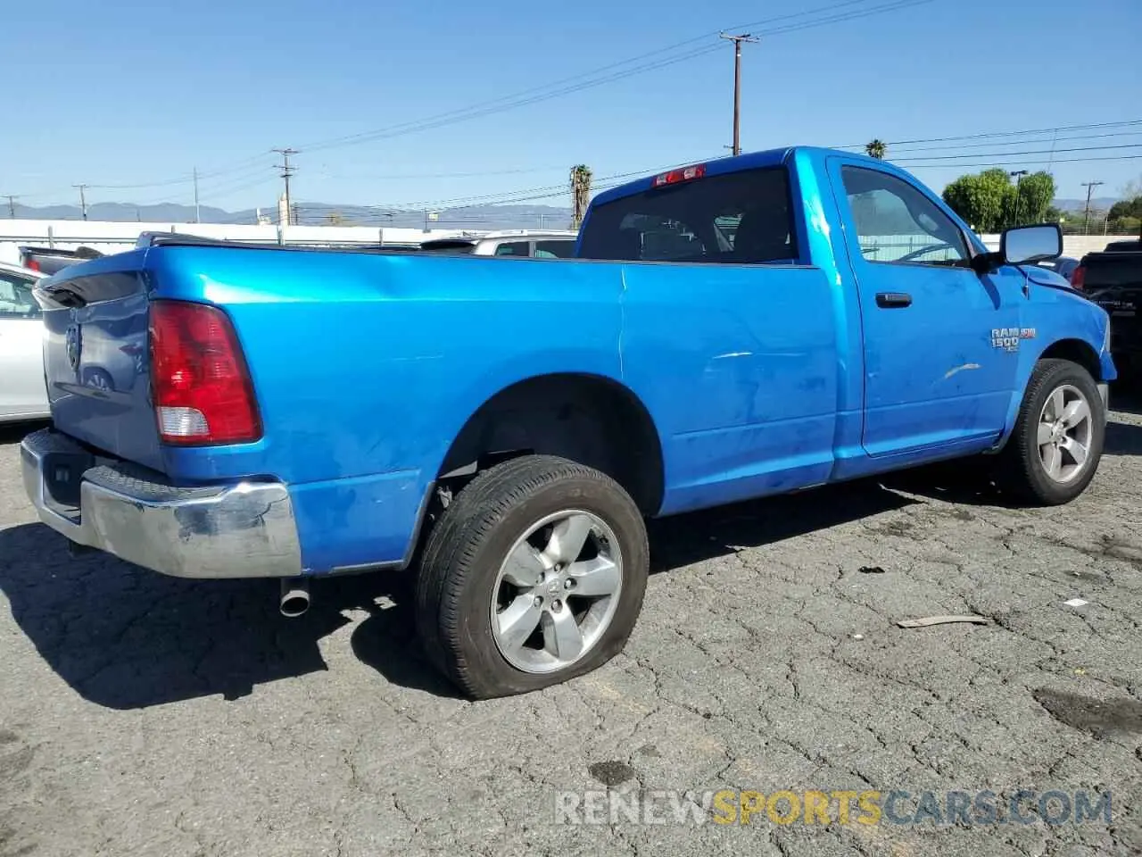 3 Photograph of a damaged car 3C6JR6DT0MG704709 RAM 1500 2021