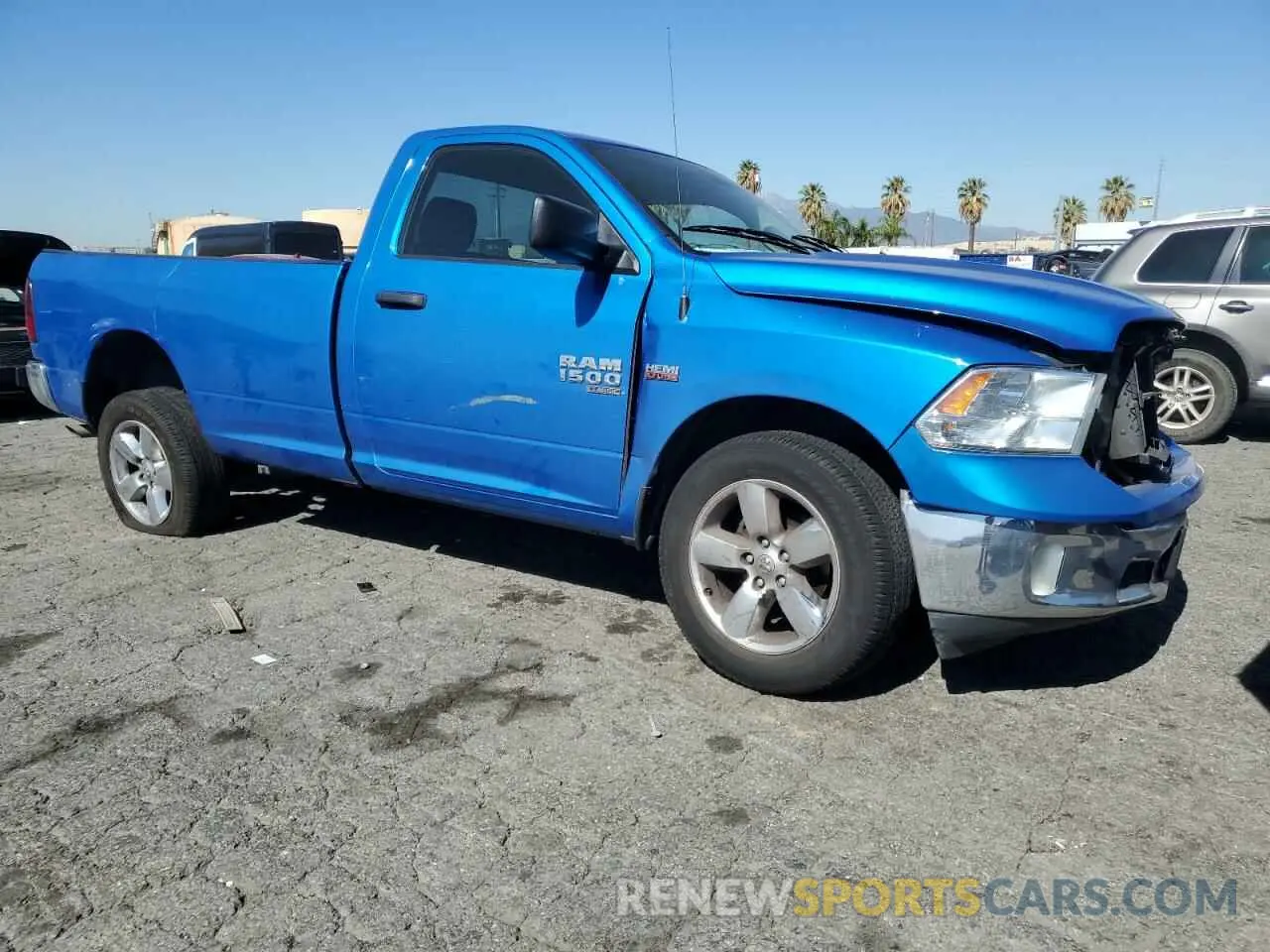4 Photograph of a damaged car 3C6JR6DT0MG704709 RAM 1500 2021