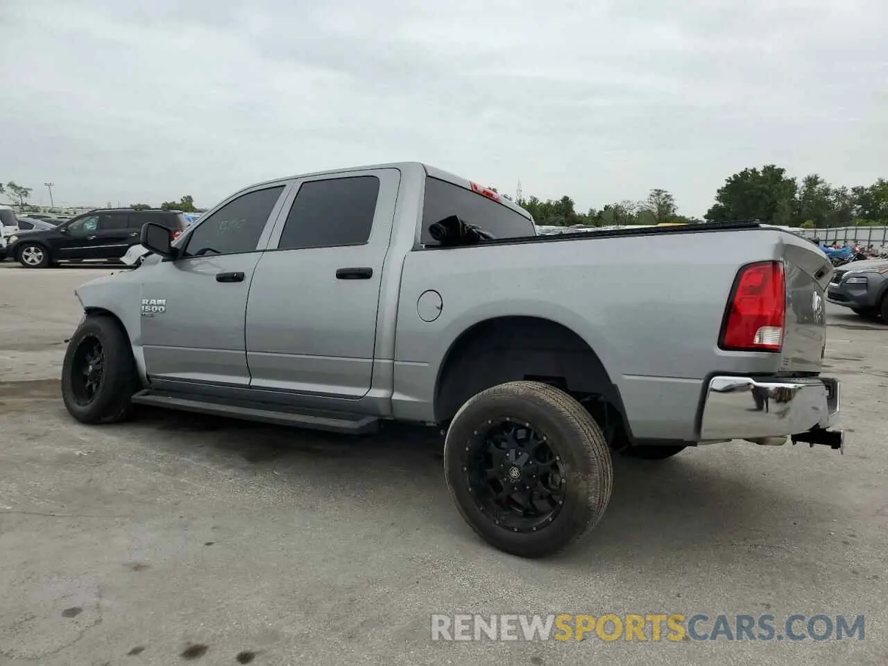 2 Photograph of a damaged car 3C6RR6KG3MG587376 RAM 1500 2021