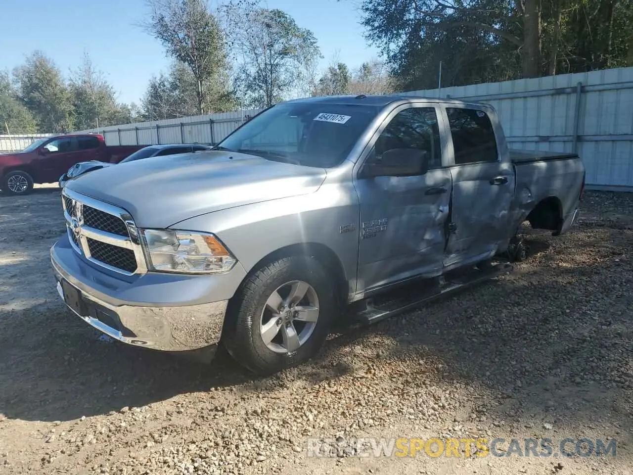 1 Photograph of a damaged car 3C6RR6KT6MG536001 RAM 1500 2021