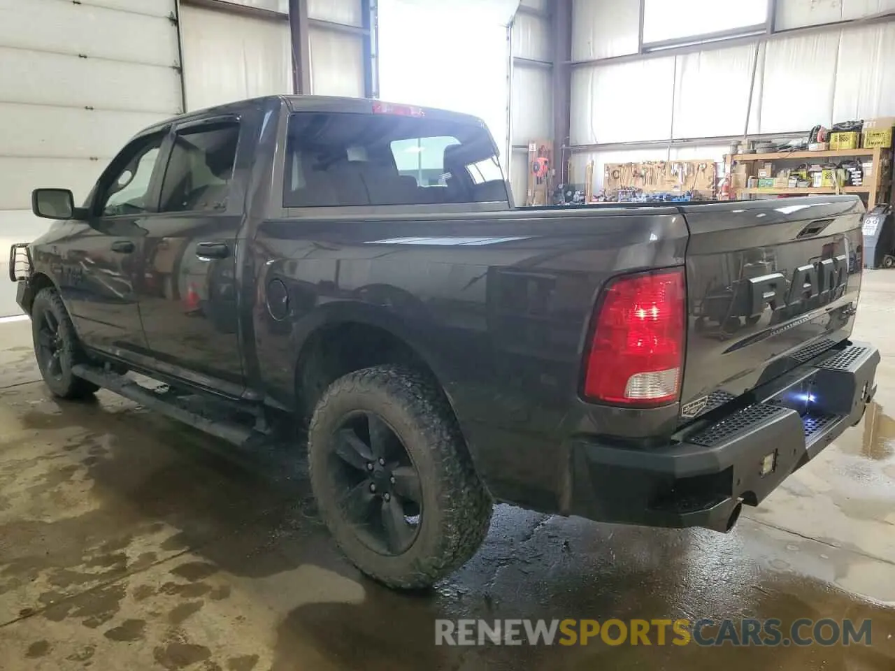 2 Photograph of a damaged car 3C6RR7KT1MG709283 RAM 1500 2021