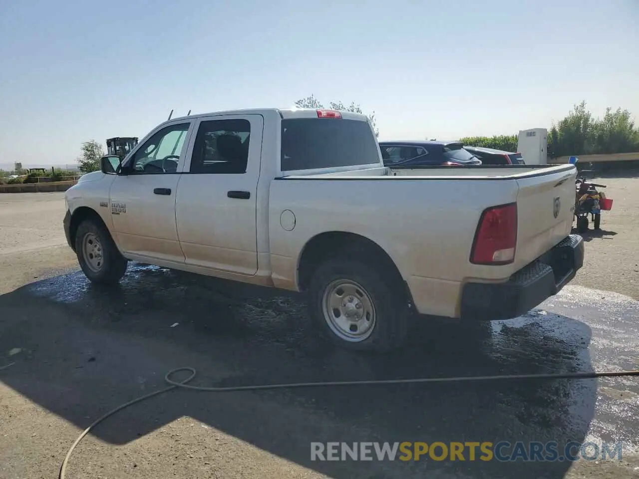 2 Photograph of a damaged car 3C6RR7KT3MG685648 RAM 1500 2021