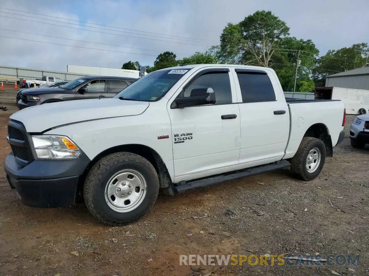 1 Photograph of a damaged car 3C6RR7KT5MG574471 RAM 1500 2021