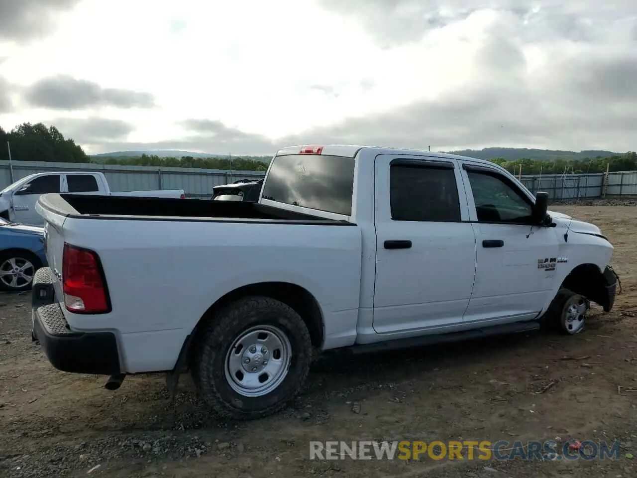 3 Photograph of a damaged car 3C6RR7KT5MG574471 RAM 1500 2021