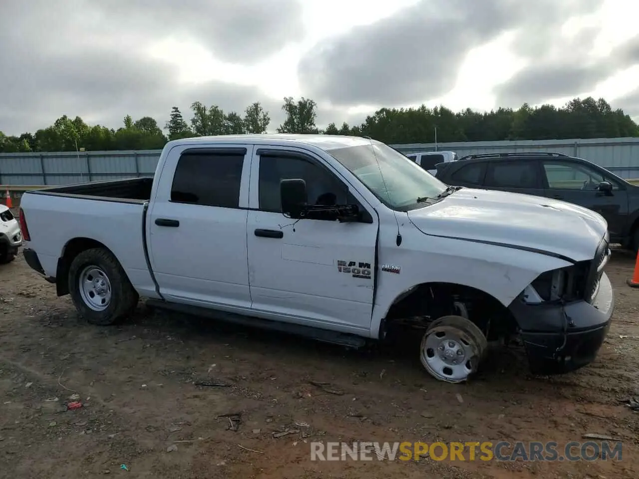 4 Photograph of a damaged car 3C6RR7KT5MG574471 RAM 1500 2021